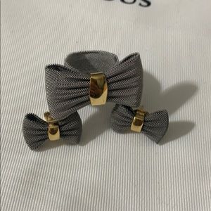 Set of Ring and earrings of steel with gold (750).